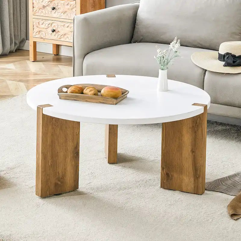 Table basse ronde avec pieds rectangulaires