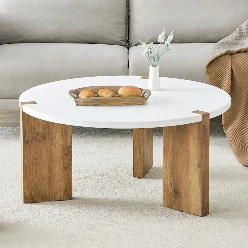 Table basse ronde avec pieds rectangulaires