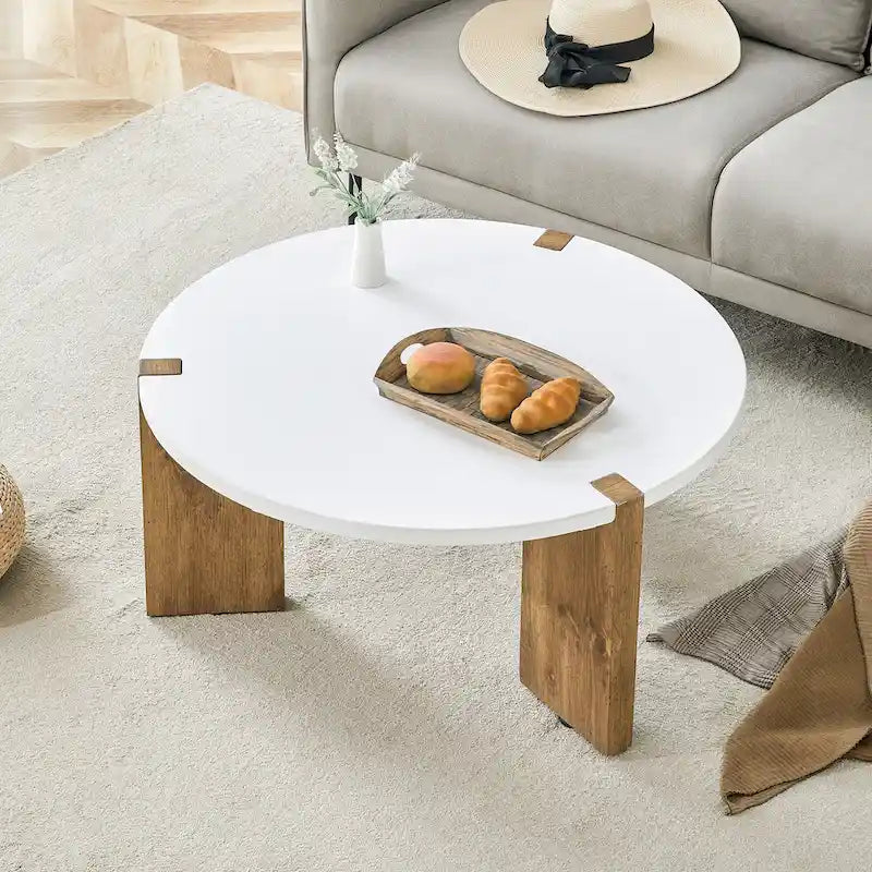 Table basse ronde avec pieds rectangulaires