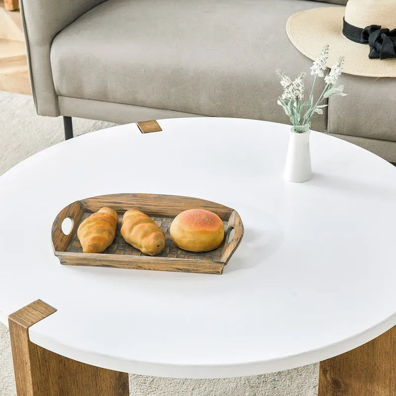 Table basse ronde avec pieds rectangulaires