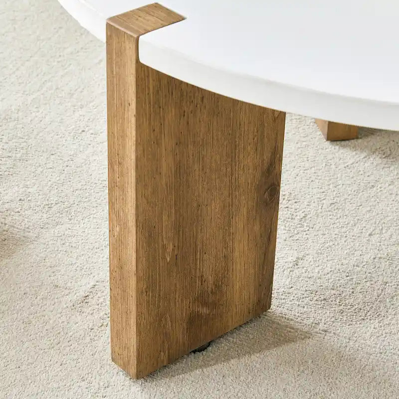 Table basse ronde avec pieds rectangulaires